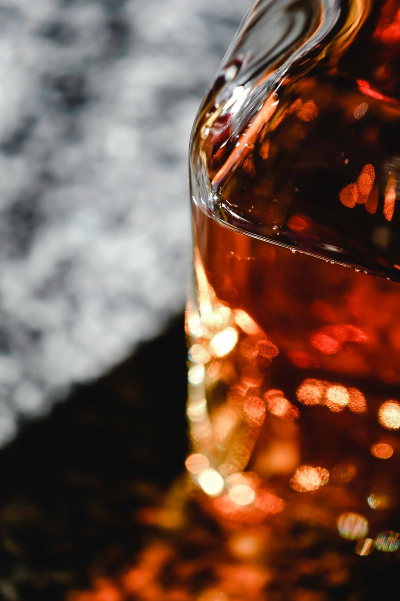 Amber liquid glowing inside glass